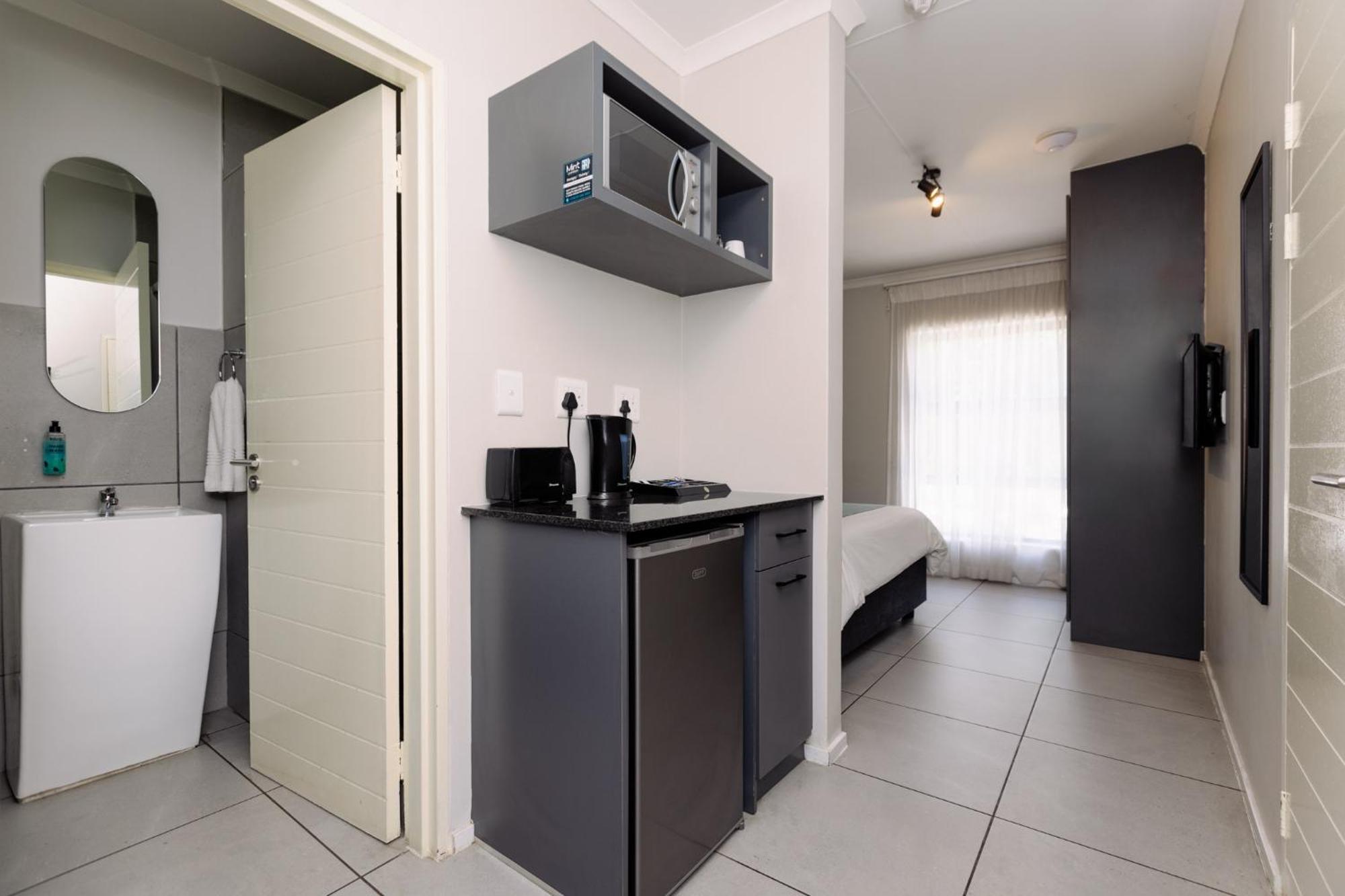 Mint Express Melrose View Apartment โจฮันเนสเบิร์ก ห้อง รูปภาพ